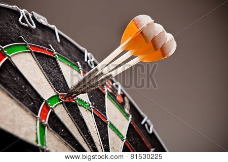 Three Darts Hitting Perfect 180 Score On Dart Board