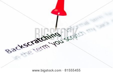 Closeup Shot Over Word Backscratching On Paper