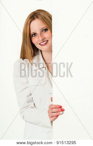 Young beauty business woman peeking around a corner