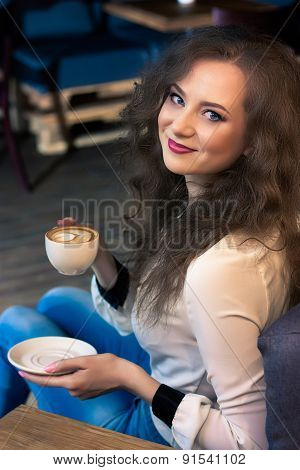 Beautiful girl with coffee