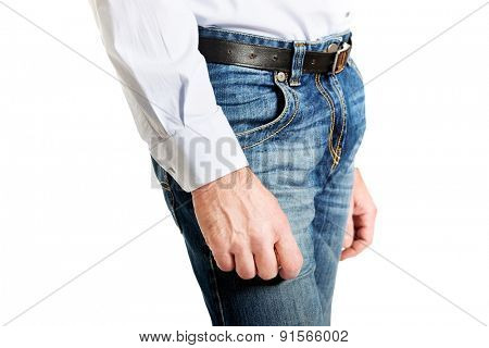 Side view of a men in jeans trousers.