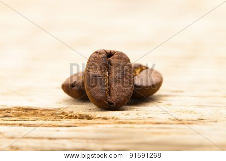 Coffee Beans On Old Wooden Table - Close Up Shot