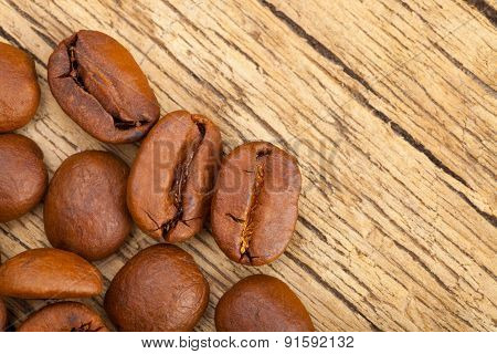 Coffee Beans On Wooden Table - Close Up Studo Shot