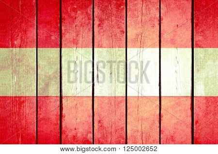 Austria wooden grunge flag. Austria flag painted on the old wooden planks. Vintage retro picture from my collection of flags.