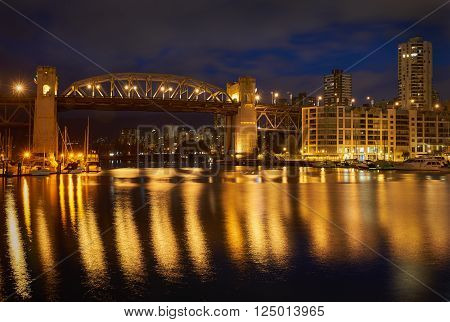 Burrard Bridge Night, Vancouver. Burrard Bridge Night, Vancouver. The view from Granville Island of the historic Burrard Street Bridge on Vancouver's False Creek. British Columbia, Canada.