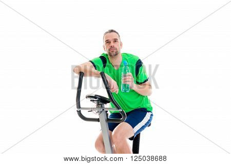 Young Manwith Water Bottle Train With Fitness Machine