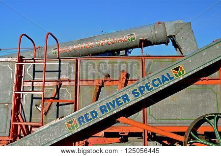ROLLAG, MINNESOTA, Sept 1, 2013: An old antique Red River Special threshing machine is displayed at the West Central Steam Threshers Reunion(WCSTR) where 1000s attend each Labor Day weekend in Rollag, MN each year.