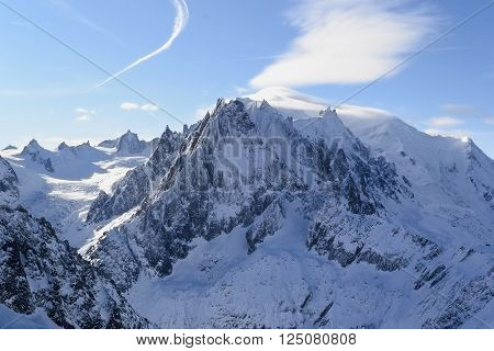 Mont Blanc Chamonix. Rocks under fresh snow