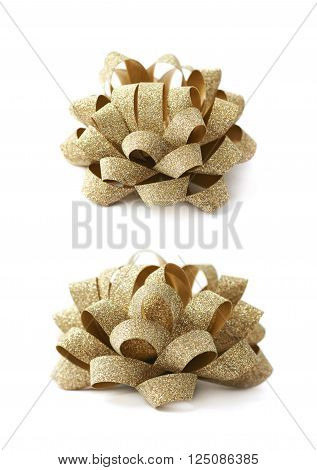 Decorational golden ribbon gift bow isolated over the white background, set collection of two diffirent foreshortenings