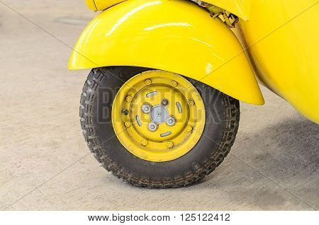Vintage Yellow Car Wheel; Classic Vehicles. Old car.