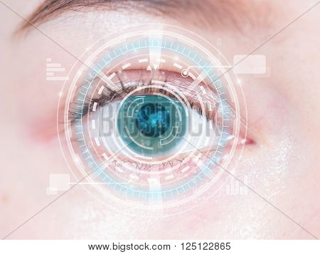 Close-up of woman's blue eye. High technology in the futuristic. scan contact lens
