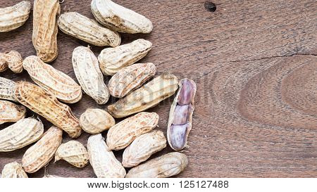 A pile of Boiled Peanuts on wooden table background.
