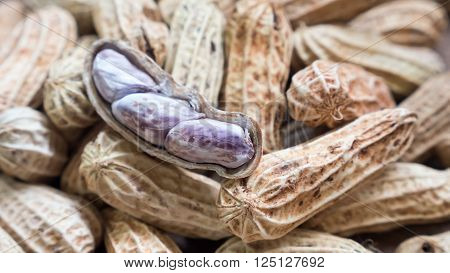A pile of Boiled Peanuts on wooden table background.