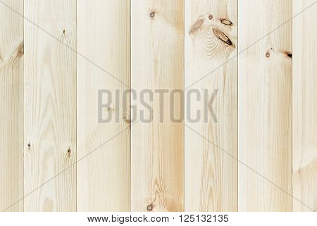 The light beige plank. The wood texture. The background. The vertical plank.