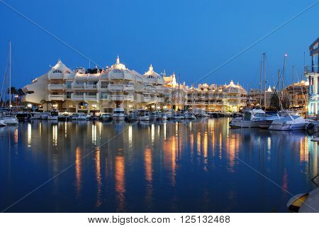 BENALMADENA, SPAIN - JUNE 29, 2008 - Boats and apartments in the marina at dusk Benalmadena Malaga Province Andalusia Spain Western Europe, June 29, 2008.