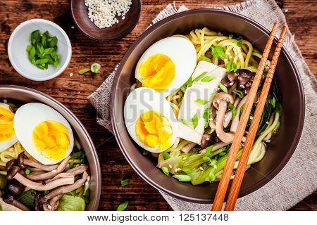 Asian miso ramen noodles with eggs tofu and shimeji mushrooms
