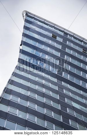 Modern Office Building In Front Of Gasometers Of Vienna In Austria