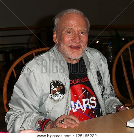 HUNTINGTON, NY-APR 5: Former astronaut Buzz Aldrin signs his book 