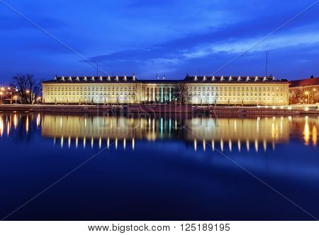 Regional Office And Odra River In Wroclaw, Poland, After Sunset.
