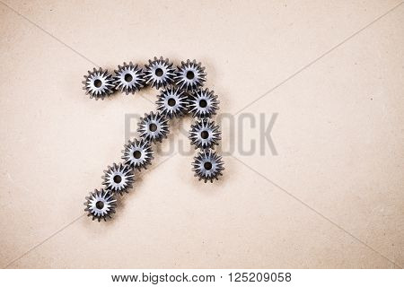 Indication concept. Mechanical components forming an arrow. Gears, industrial objects