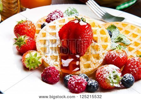 some Homemade waffles with fresh berries  fruit