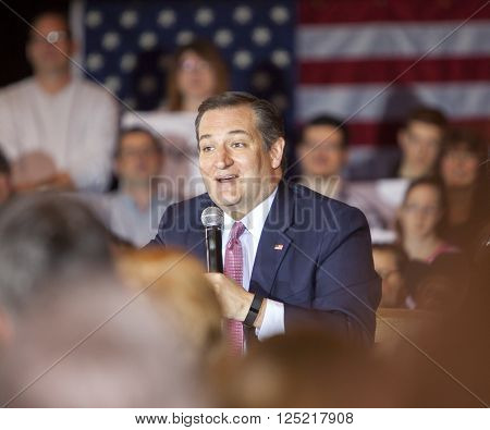 MADISON WI/USA - March 30 2016: Republican presidential candidate Ted Cruz speaks to a group of supporters during a rally before the Wisconsin presidential primary in Madison Wisconsin.