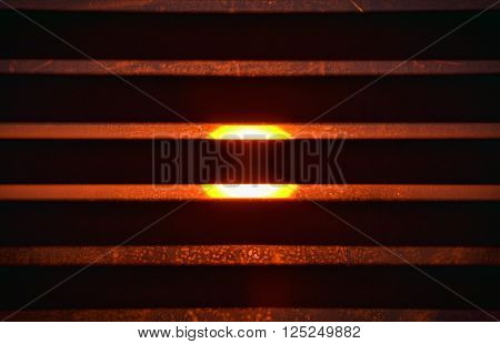 View at the sun across the sunblind during beautiful sunset