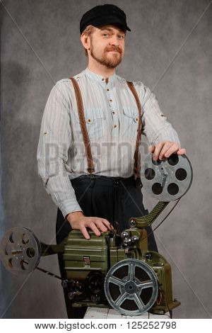 Cameraman with with a old film projection