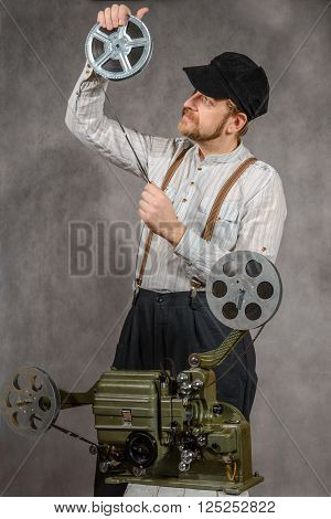 Cameraman with a film projection see on reel