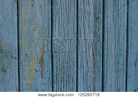 closeup old faded blue paint on wood
