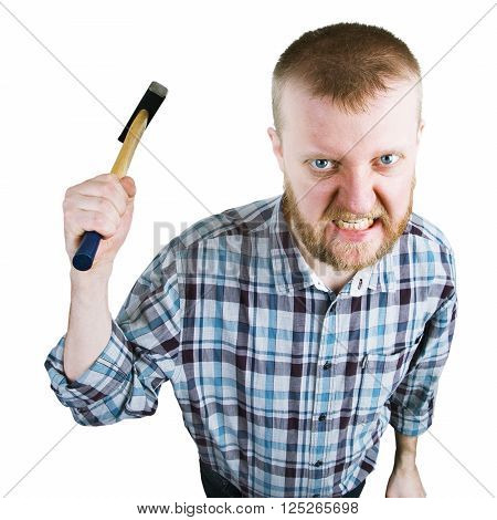 Angry bearded man swings a big hammer