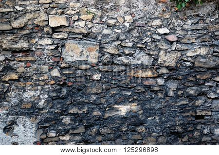 Closeup of the ancient stone wall texture