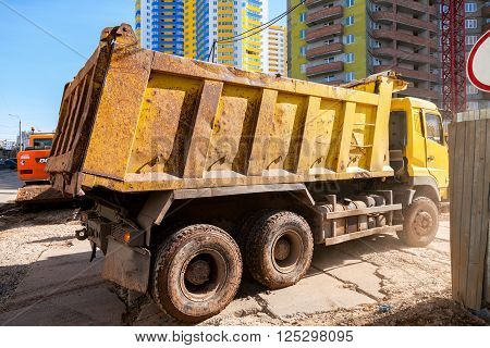 SAMARA RUSSIA - APRIL 10 2016: Heavy truck drives to the construction site