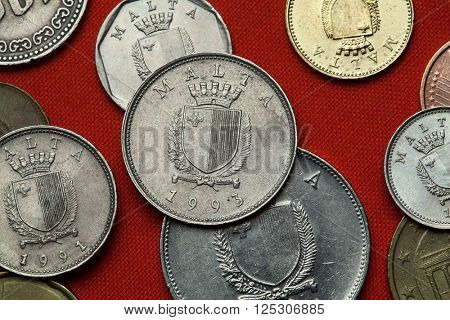 Coins of Malta. Coat of arms of Malta depicted in the Maltese lira coins. 