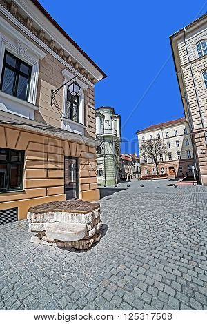 TIMISOARA ROMANIA - APRIL 3 2016: Intersection of streets with symbolic map from bronze in the historic center of Timisoara Romania.
