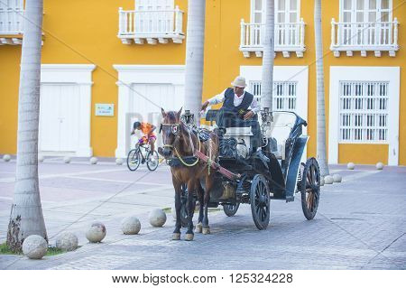 CARTAGENA COLOMBIA - FEB 04 : A Horse drawn carriage in Cartagena Colombia on Februery 04 2016. The historic port city Cartagena is UNESCO World Heritage Site since 1984.