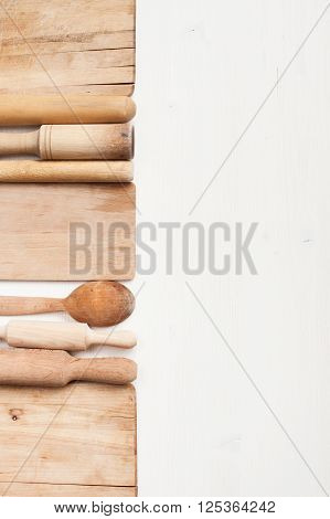 Kitchen utensils on the white wooden table