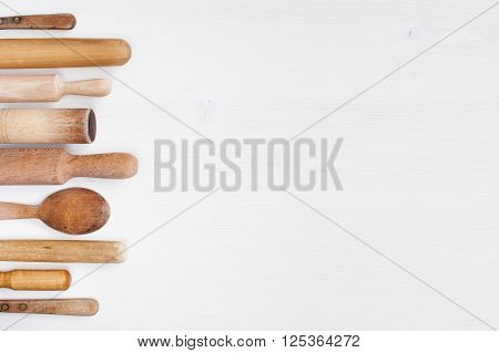 Kitchen utensils on the white wooden table