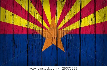 Arizona state grunge wood background with Arizonan flag painted on aged wooden wall.