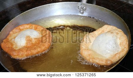 Italian Traditional Sweet Pastry Frying In Very Hot Oil