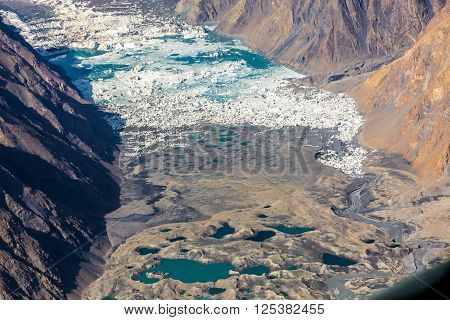 Mountain Landscape with Unique Moraine Glacier Lakes and Icefall with Rock and Snow Slopes and Summits on Horizon