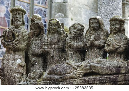 Saint-Thegonnec (Finistere Brittany France): the medieval church with the typical stone calvary
