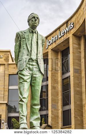 GLASGOW SCOTLAND - APRIL 02 2016: The statue of Donald Dewar that stands outside the Glasgow Royal Concert Hall in Buchannan Street.