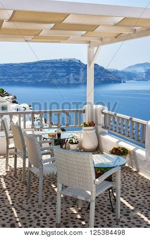 View from a restaurant terrace in Oia Santorini island in Greece.