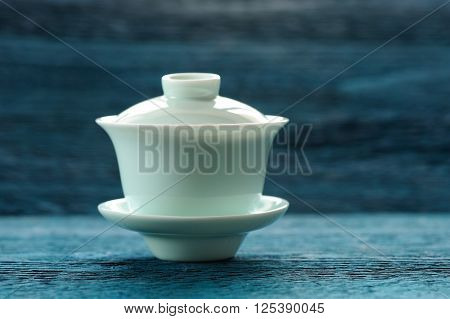 Aquamarine gaiwan chinese teaware on blue background copyspace
** Note: Soft Focus at 100%, best at smaller sizes