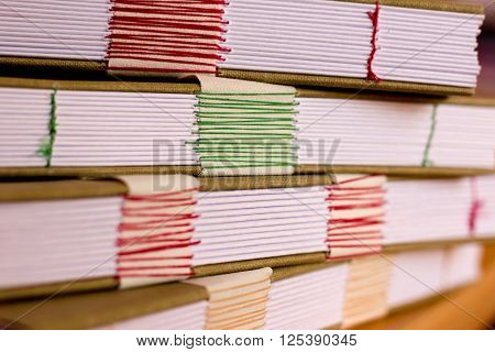 Detail of Handmade Text Blocks with Colorful Threads
