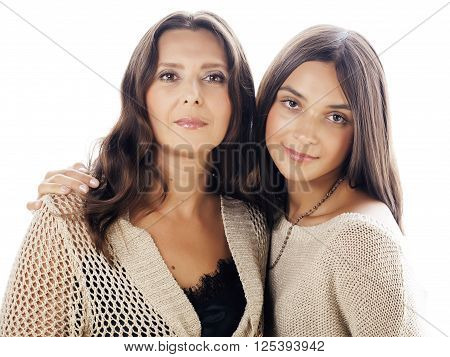 cute pretty teen daughter with real mature mother hugging, fashion style brunette makeup close up tann s, warm colors isolated on white background