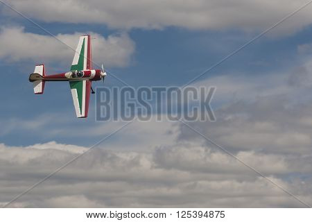 Minsk Belarus-June 21 2014: SU-26M Acrobatics Stunt Plane Performing Elements in Air During Aviation Sport Event Dedicated to the 80th Anniversary of DOSAAF Foundation in Minsk on June 21 2014 in Minsk Republic of Belarus