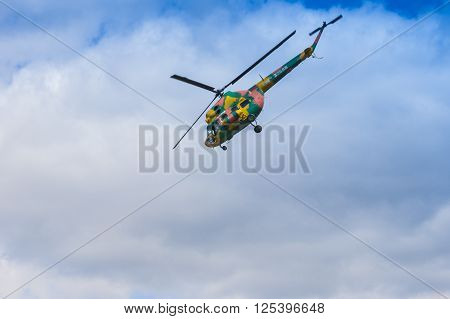 Minsk Belarus-June 21 2014: MI-2 Helicopter on Air During Aviation Sport Event Dedicated to the 80th Anniversary of DOSAAF Foundation in Minsk on June 21 2014 in Minsk Republic of Belarus