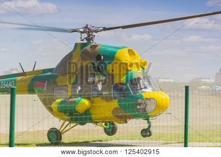 Minsk, Belarus-June 21, 2014: MI-2 Helicopter on Air During Aviation Sport Event Dedicated to the 80th Anniversary of DOSAAF Foundation in Minsk on June 21, 2014 in Minsk, Republic of Belarus